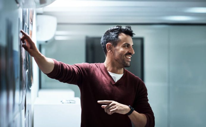 Man discusses website goals during onboarding