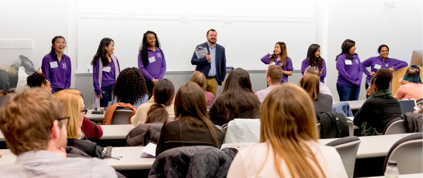 A group of people in the classroom