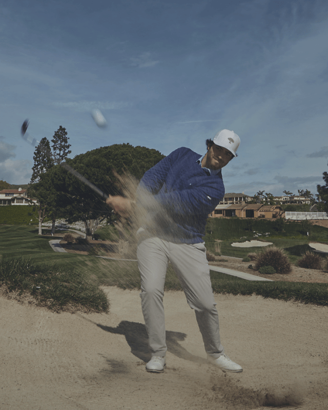 A man playing golf